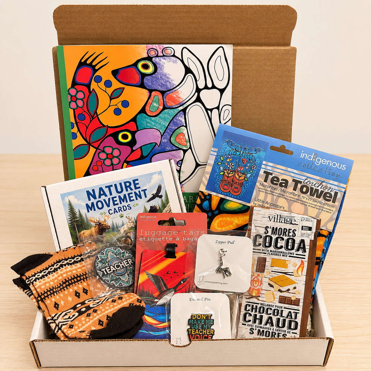 The Northern Educators Box filled with teaching goodies, a camp mug, notebooks and stickers